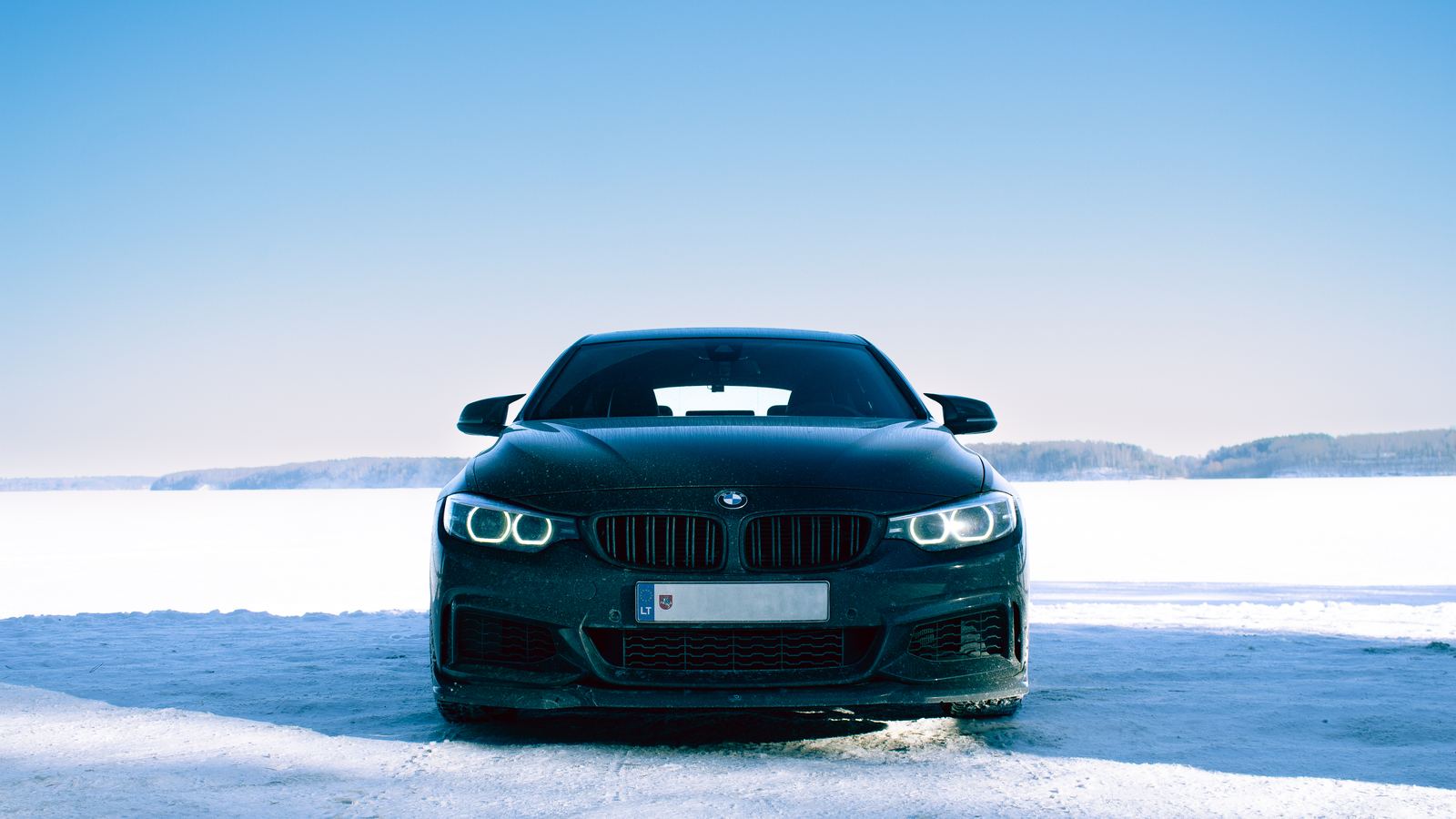 BMW 4-series head-on at a frozen lake