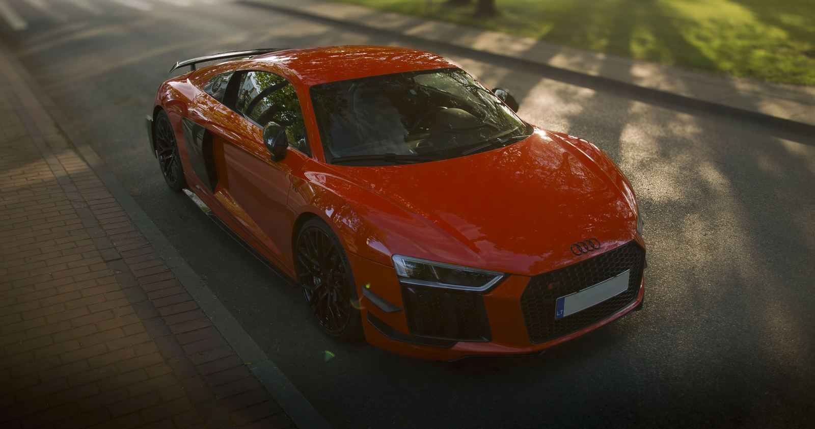 Red Audi R8 on the road